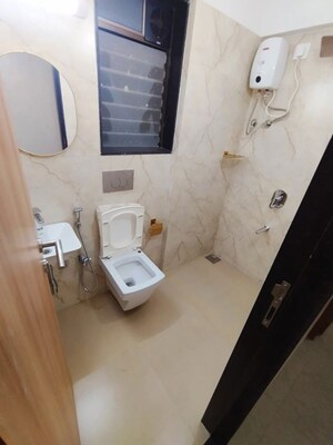 Bathroom in 2 BHK Apartment at Pratham ARC Aura, Andheri West – for Rent