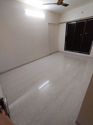 Bedroom in 2 BHK Apartment at Pratham ARC Aura, Andheri West – for Rent