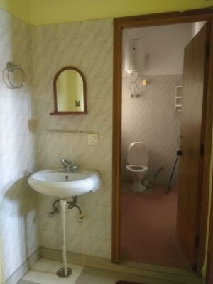 Bathroom in 2 BHK Builder Floor at Vasant Vihar – for Rent