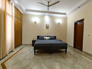 Bedroom in 4 BHK Builder Floor at Sarvodaya Enclave – for Rent