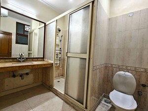 Bathroom in 4 BHK Builder Floor at Sarvodaya Enclave – for Rent