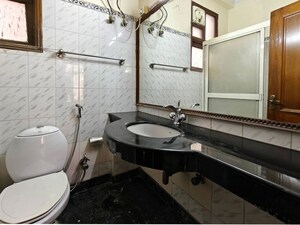Bathroom in 4 BHK Builder Floor at Sarvodaya Enclave – for Rent