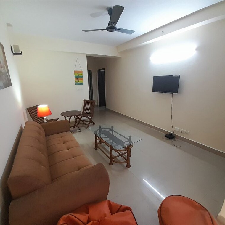 Living Room, logix-blossom-greens 2.5 Bedroom 1234 Sq.Ft. Apartment In Sector 143 Noida 9086343