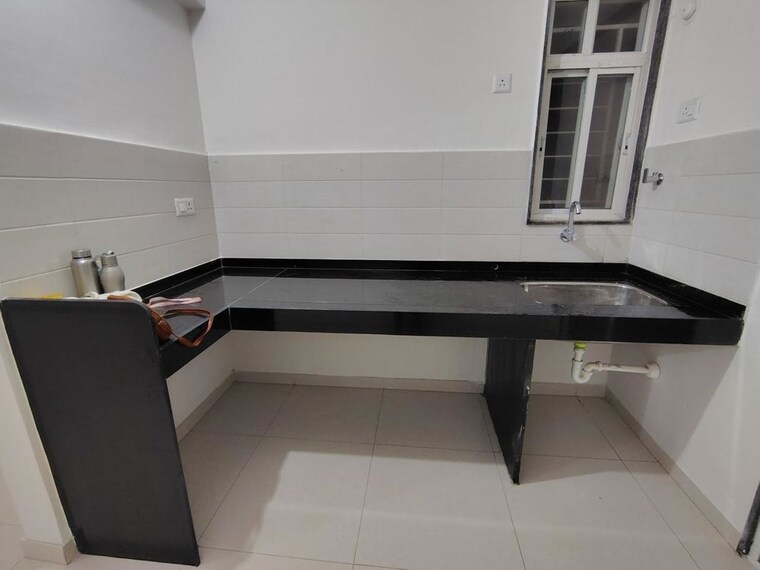 Kitchen, saheel-itrend-life 2 Bedroom 950 Sq.Ft. Apartment In Wakad Pune 10553447