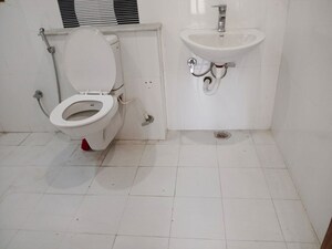 Bathroom in 4 BHK Apartment at Mahagun Mirabella, Sector 79 – for Sale