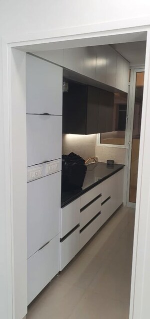 Kitchen in 2.5 BHK Apartment at Mahagun Mirabella, Sector 79 – for Rent