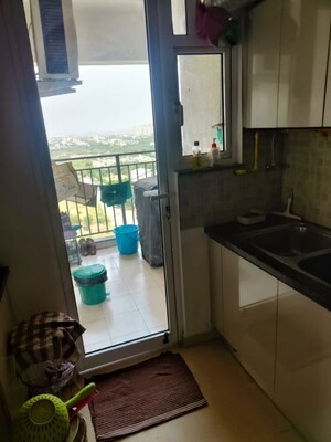 Kitchen in 4 BHK Apartment at Godrej Woods, Sector 43 – for Rent