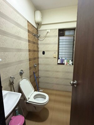 Bathroom in 3 BHK Apartment at DLH Swapnadeep, Andheri West – for Rent