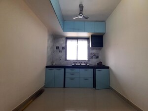 Kitchen in 1 BHK Apartment at Gokuldham Complex, Goregaon East – for Rent