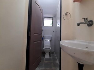 Bathroom in 1 BHK Apartment at Gokuldham Complex, Goregaon East – for Rent