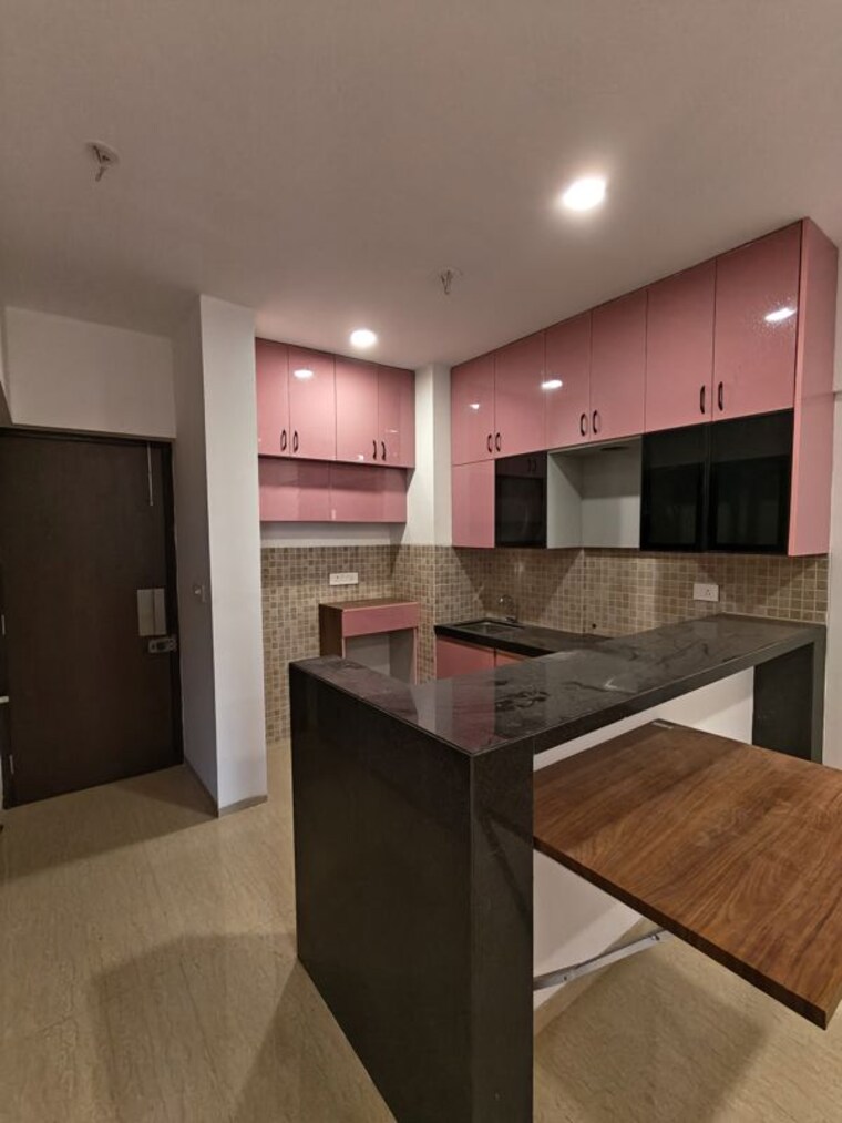 Kitchen, lodha-belmondo 1 Bedroom 500 Sq.Ft. Apartment In Gahunje Pune 10478541