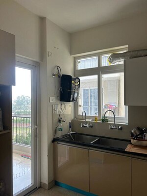 Kitchen in 3 BHK Apartment at Artique Uptown Skylla, International Airport Road – for Rent