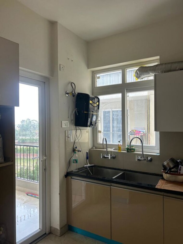 Kitchen, artique-uptown-skylla 3 Bedroom 1860 Sq.Ft. Apartment In International Airport Road Zirakpur 10553712