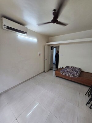 Room in 2 BHK Apartment at Mittal Brothers Whistling Palms, Wakad – for Rent