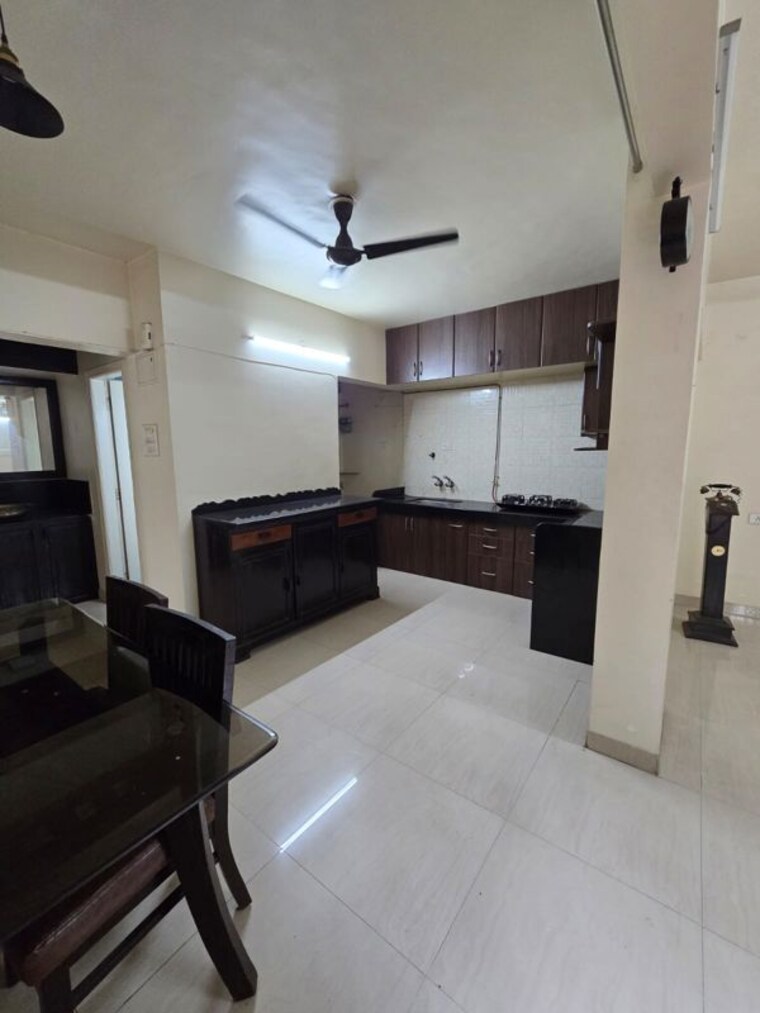 Kitchen, mittal-brothers-whistling-palms 2 Bedroom 850 Sq.Ft. Apartment In Wakad Pune 10541771