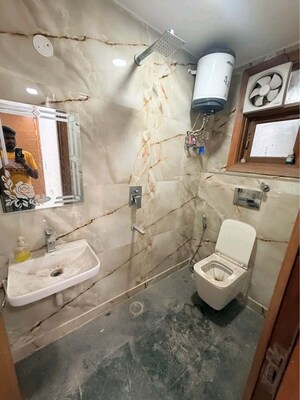 Bathroom in 2 BHK Builder Floor at Chattarpur – for Rent