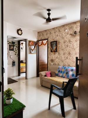 Living Room in 2 BHK Apartment at Nexus Gulmohar, Charholi Budruk – for Sale