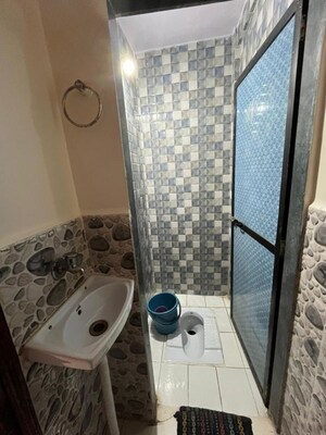 Bathroom in 1 BHK Apartment at Pushpmala CHS, New Panvel – for Rent