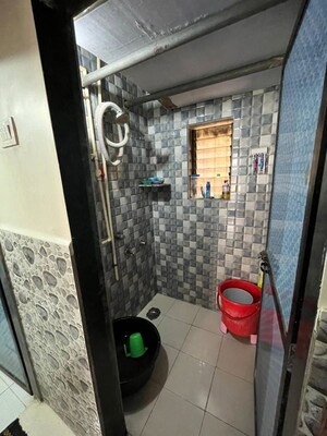 Bathroom in 1 BHK Apartment at Pushpmala CHS, New Panvel – for Rent