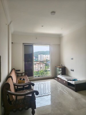 Living Room in 2 BHK Apartment at Crescent Silverwoods, Powai – for Rent