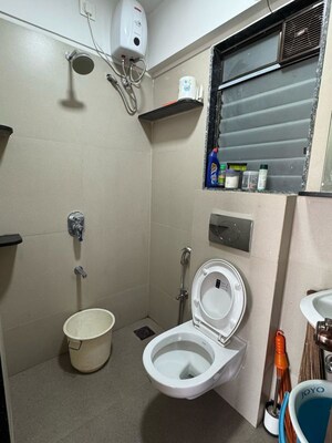 Bathroom in 1 BHK Apartment at Je And Vee Om Trimurti, Malad East – for Sale