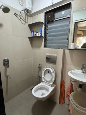 Bathroom in 1 BHK Apartment at Je And Vee Om Trimurti, Malad East – for Sale
