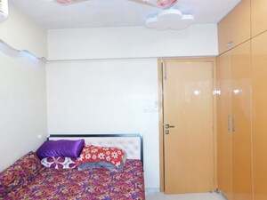 Bedroom in 2 BHK Apartment at Lalani Grandeur, Goregaon East – for Sale