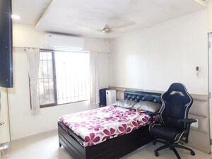 Bedroom in 2 BHK Apartment at Lalani Grandeur, Goregaon East – for Sale