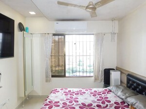 Bedroom in 2 BHK Apartment at Lalani Grandeur, Goregaon East – for Sale