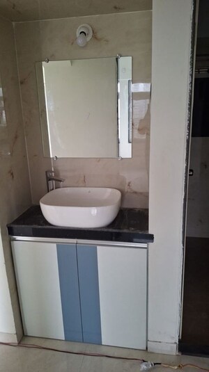 Bathroom in 3 BHK Apartment at Mhada 24 LIG Apartments, Goregaon West – for Rent