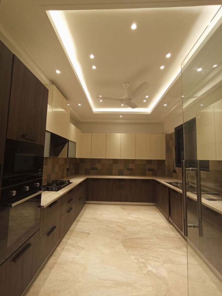Kitchen, kailash colony 4 Bedroom 5000 Sq.Ft. Builder Floor In Kailash Colony Delhi 10553989