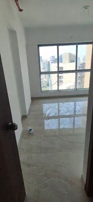 Room in 3 BHK Apartment at Infinity Paradise CHS, Goregaon West – for Sale