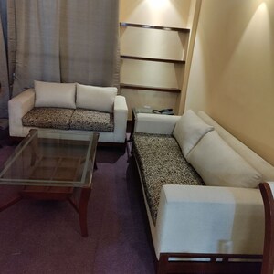 Living Room in 1 BHK Apartment at Sushant Lok I – for Rent