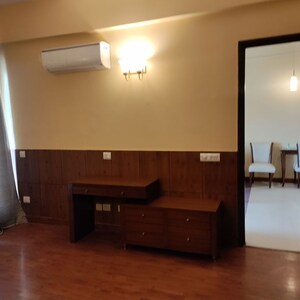 Living Room in 1 BHK Apartment at Sushant Lok I – for Rent