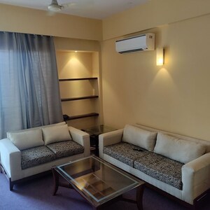 Living Room in 1 BHK Apartment at Sushant Lok I – for Rent