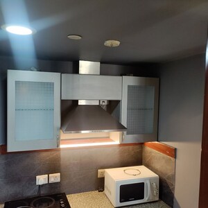Kitchen in 1 BHK Apartment at Sushant Lok I – for Rent