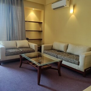 Living Room in 1 BHK Apartment at Sushant Lok I – for Rent