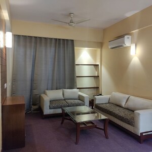 Living Room in 1 BHK Apartment at Sushant Lok I – for Rent