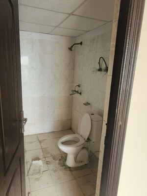 Bathroom in 2 BHK Apartment at Aims Golf City, Sector 75 – for Rent