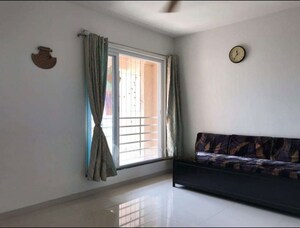 Living Room in 2 BHK Apartment at Puranik Rumah Bali, Ghodbunder Road – for Sale