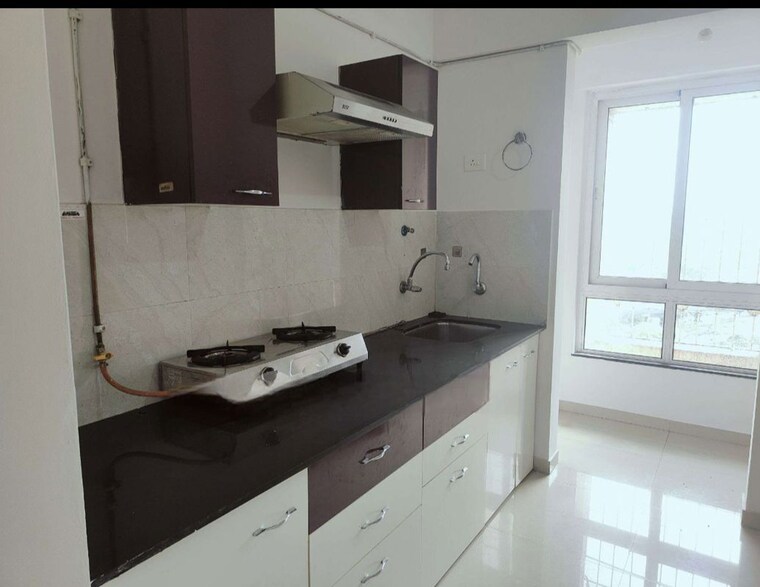 Kitchen, puranik-rumah-bali 2 Bedroom 596 Sq.Ft. Apartment In Ghodbunder Road Thane 10554103