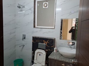 Bathroom in 3 BHK Builder Floor at Ansal Plaza Sector-23, Sector 23 – for Rent