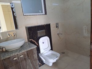 Bathroom in 3 BHK Builder Floor at Ansal Plaza Sector-23, Sector 23 – for Rent