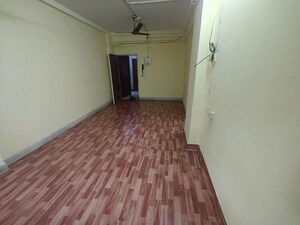 Living Room in 1 BHK Apartment at Powai Jaltarang CHS, Powai – for Sale