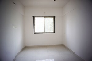Room in 2 BHK Apartment at Tathawade – for Sale