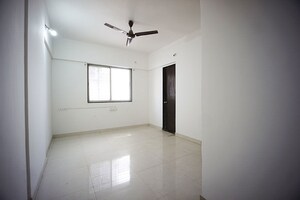 Room in 2 BHK Apartment at Tathawade – for Sale