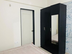 Room in 3 BHK Apartment at Swiss County, Thergaon – for Sale
