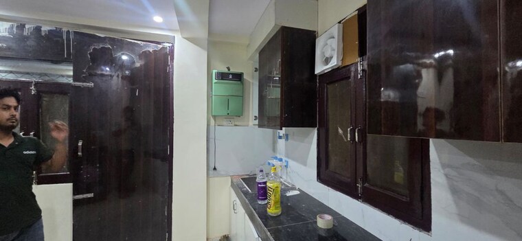 Kitchen, dev-apartments-sector-49 1 Bedroom 500 Sq.Ft. Builder Floor In Sector 49 Noida 10554234