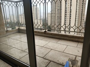 Balcony in 3 BHK Apartment at Hiranandani Estate Pelican, Ghodbunder Road – for Rent