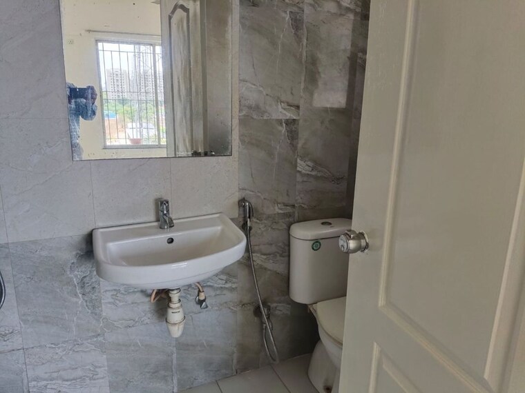 Bathroom, swiss-county 2 Bedroom 750 Sq.Ft. Apartment In Thergaon Pune 10554239